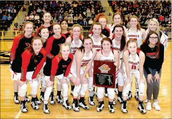  ?? MARK HUMPHREY ENTERPRISE-LEADER ?? The Farmington girls basketball team poses with their newly-won District 4A-1 championsh­ip trophy Saturday. The Lady Cardinals defeated Harrison in the finals, 54-41; after beating Pea Ridge, 56-39, in the semifinals Thursday at Prairie Grove. This week Farmington takes on Pottsville Wednesday at 7 p.m. in a first-round Regional game at Berryville’s Bobcat Arena.