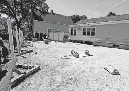  ?? JOURNAL SENTINEL RICK WOOD / MILWAUKEE ?? Milwaukee's midcentury time capsule ice cream drink bar At Random is adding a patio that it's calling Ice Cream Social. The outdoor seating area is being added to the south side of the bar, at 2501 S. Delaware Ave. in Bay View.