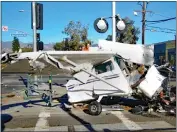  ?? PHOTO BY MIKE MEADOWS ?? A plane crashed after taking off from Whiteman Airport in January. Officials want a probe of the airport.