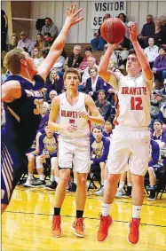  ?? Westside Eagle Observer/RANDY MOLL ?? Gravette junior Kaleb Furlow goes up for a shot in play against the visiting Berryville Bobcats on Friday in Lion Field House.
