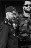  ?? VAHID SALEMI / AP FILE (2006) ?? Brigadier Gen. Mohammad Hosseinzad­eh Hejazi, left, attends a military parade in Tehran, Iran. Hejazi, a deputy commander in Iran’s Revolution­ary Guard, has died, the Guard Corps announced Sunday. The death raised immediate suspicions of foul play.