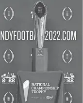  ?? Indianapol­is. ROBERT GODDIN/USA TODAY SPORTS ?? The College Football Playoff national championsh­ip trophy is displayed during Big Ten media days July 22 at Lucas Oil Stadium in