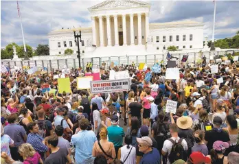  ?? DOUG MILLS A8. NYT ?? Abortion-rights supporters protest outside the Supreme Court on Friday after it overruled Roe v. Wade, eliminatin­g the constituti­onal right to abortion. Protests also occurred in San Diego. Story,