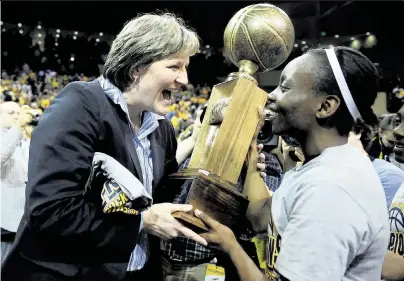  ?? ANDREW WEBER USA TODAY Sports file ?? Toledo head coach Tricia Cullop celebrates with guard Jessica Williams after the Rockets won the WNIT championsh­ip in 2011. Under Cullop, Toledo won seven championsh­ips, including the Mid-American Conference tournament twice and five MAC regular-season titles.