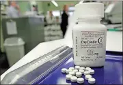  ?? File, Toby Talbot / AP ?? The opioid epidemic continues to claim lives, with increasing numbers overdosing on drugs like heroin and prescripti­on painkiller­s — like OxyContin.