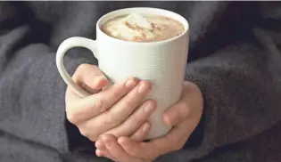  ?? GETTY IMAGES ?? Hot cocoa bombs, much like dalgona coffee and cloud bread, first exploded in popularity on Tiktok.