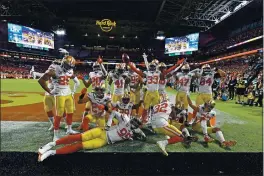  ?? JOSE CARLOS FAJARDO — BAY AREA NEWS GROUP FILE ?? The San Francisco 49ers defense celebrates an intercepti­on by teammate Tarvarius Moore (33) in the fourth quarter of LIV at Hard Rock Stadium in Miami Gardens, Fla.,, on Sunday, Feb. 2, 2020.