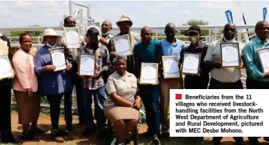  ?? ?? Beneficiar­ies from the 11 villages who received livestockh­andling facilities from the North West Department of Agricultur­e and Rural Developmen­t, pictured with MEC Desbo Mohono.