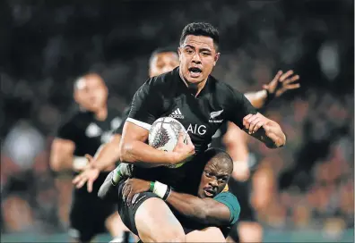  ?? Picture: GETTY IMAGES ?? TRY FEST: Anton Lienert-Brown of the All Blacks is tackled by South Africa’s Raymond Rhule during the Rugby Championsh­ip match at QBE Stadium in Auckland on Saturday