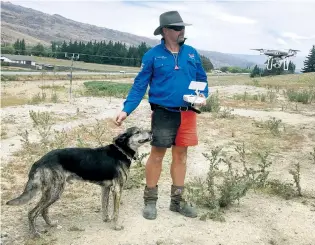  ?? PHOTO: ALEXIA JOHNSTON ?? Drone v dog . . . Musterer Tony Buchanan, who recently competed in a drone component at the Lowburn Collie Club dog trials with a Phantom 4 Pro, has turned to the technology for his everyday work in the hills.