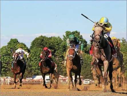  ?? PHOTO SPENCER TULIS/FOR THE SARATOGIAN ?? Catherinet­hegreat takes to the inside rail to capture the Grade 3 $150,000 Schuylervi­lle for 2-year-old fillies on opening day at historic Saratoga Race Course.