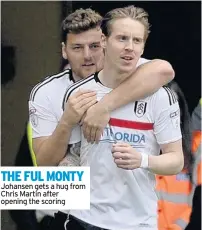  ??  ?? THE FUL MONTY Johansen gets a hug from Chris Martin after opening the scoring