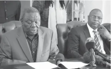  ??  ?? MDC-T leader Morgan Tsvangirai (left) and Welshman Ncube at the signing of the MoU between their parties in Harare recently