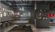  ?? Photo courtesy of The Star/Provident Realty Advisors ?? The basement offers an informal, speakeasy-type lounge, and includes a large collection of Texaco memorabili­a.