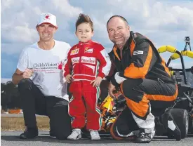  ?? Picture: REGI VARGHESE ?? Childs Vision CEO Grant Hudson, with prodigy Piero Pascazio, 4, and Ian Holm who will drive in the FMX and Monster Truck Spectacula­r.