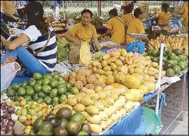  ?? A.N. BANAYNAL/THE FREEMAN ?? Fruits and vegetables produced in neighborin­g barangays are sold at Plaza Sugbo in Cebu City in this photo taken last week.