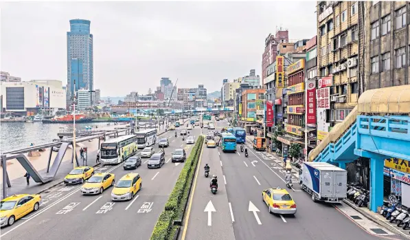  ?? ?? Thriving port city: Keelung in northeaste­rn Taiwan. Left, Tom Fremantle is inspired by the island