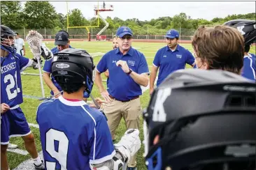  ?? NATE HECKENBERG­ER - FOR MEDIANEWS GROUP ?? Kennett coach Bob Alvord addresses his team after the loss to Radnor in the state title game on Saturday at West Chester East.