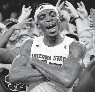  ?? [AP PHOTO] ?? Arizona State’s Zylan Cheatham celebrates with fans after the Sun Devils stunned No. 1-ranked Kansas 80-76 on Saturday in Tempe. Duke could replace the Jayhawks atop the rankings.