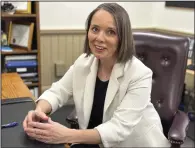  ?? (AP/David Sharp) ?? Maine Democratic Secretary of State Shenna Bellows speaks with an aide in her office after the House voted down an attempt to impeach her on Tuesday in Augusta, Maine.