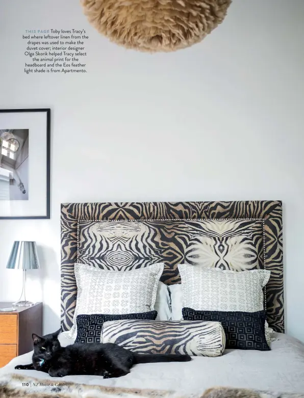  ??  ?? THIS PAGE Toby loves Tracy’s bed where leftover linen from the drapes was used to make the duvet cover; interior designer Olga Skorik helped Tracy select the animal print for the headboard and the Eos feather light shade is from Apartmento.