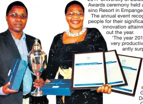  ??  ?? Professor Gregory Kamwendo, Arts Faculty Dean and Prof Antonia Nzama, Arts Faculty Deputy Dean, delighted after their faculty scooped first prize for the Research Department of the Year award