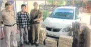  ?? PHOTO: SOURCED ?? Salim was caught with 65 cartons of beer and other liquor. The white Maruti SX4 car has been seized.