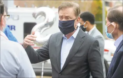  ?? Ned Gerard / Hearst Connecticu­t Media ?? Gov. Ned Lamont wants state resident to remain vigilant in the coronaviru­s crisis, and wear masks in public while keeping social distances of at least six feet from others.