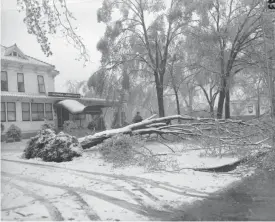 ?? ?? The Herman Lohmeyer funeral home with a fallen tree across the yard after a sleet storm. Initially published in the Springfiel­d News & Leader on April 19, 1953.