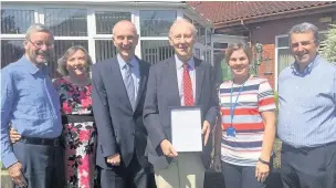  ??  ?? ●●From left are Peter and Wendy Howe of the Tiltas Trust; Dr Philip Lomax, medical director, St Ann’s Hospice; Tom Macan, chairman of Tiltas Trust and former British Ambassador to Lithuania; Sian Burgess, clinical services manager, St Ann’s Hospice;...