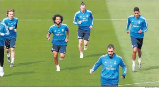  ?? PACO CAMPOS / EFE ?? Modric, Marcelo, Bale, Benzema y Varane hacen series de carrera en Valdebebas.