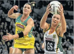  ?? Picture: GETTY IMAGES ?? ON THE BALL: South Africa’s Lenzie Potgieter, right, grabs a pass from Australia’s Sharni Layton during their test match at the Vector Arena in Auckland, New Zealand, at the weekend