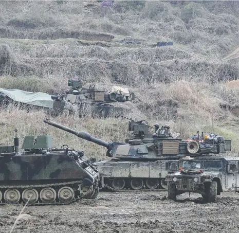  ?? Picture: AP ?? US Army troops conduct a military exercise on Friday in Paju, near the border with North Korea, as the aggressive stances of North Korean Leader Kim Jong-un and US President Donald Trump increase tensions on the Korean Peninsula