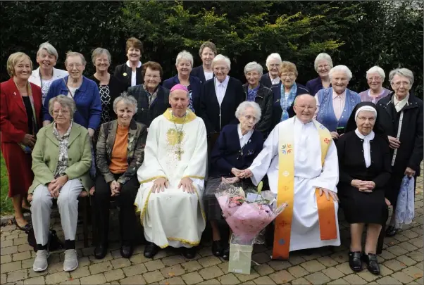  ??  ?? Sr Rita Clare pictured with Bishop Denis Brennan, Fr Cushen and the Sisters of Mercy at Sr Rita’s 100th birthday celebratio­ns at Valentia Nursing Home, Camolin.