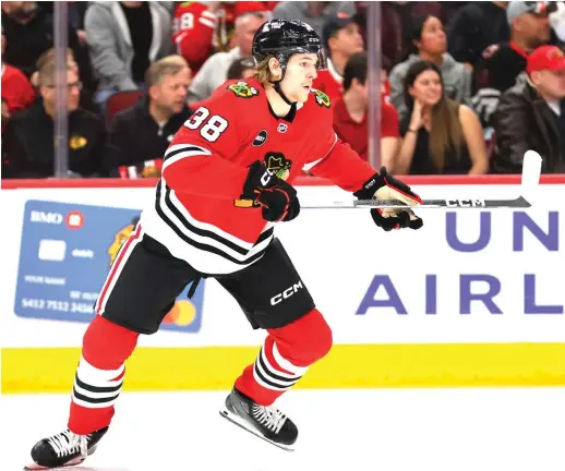  ?? MICHAEL REAVES/GETTY IMAGES ?? Blackhawks defenseman Ethan Del Mastro played in his first NHL game Friday. He also likely will play in the home finale Sunday against the Hurricanes.