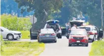  ?? Photo / AP ?? Roads were closed for hours during a standoff yesterday, after an armed man tried to breach the FBI’s Cincinnati office.