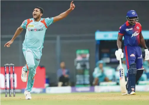  ?? Courtesy: IPL website ?? Lucknow Super Giants’ Mohsin Khan celebrates after taking the wicket of Delhi Capitals’ Rishabh Pant during their match on Sunday.