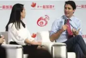  ?? SEAN KILPATRICK/THE CANADIAN PRESS ?? Justin Trudeau takes part in an event at Sina Weibo headquarte­rs in Beijing Monday. The PM spent part of his first day in China promoting tourism to Canada and green technology.