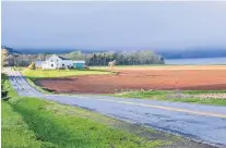  ??  ?? Near Blomidon, just as the rain clouds were clearing. (Cape Blomidon is lost in the fog)