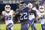  ?? MARK ZALESKI / AP ?? Derrick Henry is on pace to surpass Eric Dickerson’s record (2,105) in a season and become the first player with two consecutiv­e 2,000-yard seasons.