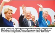  ?? (REUTERS) ?? Social Democratic Party (SPD) leader and top candidate for chancellor Olaf Scholz, Mecklenbur­g-western Pomerania state Prime Minister Manuela Schwesig and SPD member Franziska Giffey