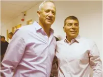  ?? (Marc Israel Sellem/The Jerusalem Post) ?? FORMER CHIEFS OF STAFF Benny Gantz (left) and Gabi Ashkenazi pose after announcing the formation of Pnima yesterday in Lod.