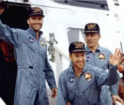  ??  ?? ▼ Welcome return: Apollo 13’s crew (from left) Fred Haise, Jim Lovell and Jack Swigert are back safely