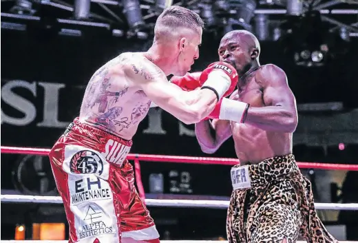  ?? / NICK LOURENS ?? Jared ‘Mr Hollywood’ Silverman pounding his way to an impressive win against Vusi “Thunder” Bilankulu in Boksburg in April, his comeback fight since his severe shooting injuries in 2014.