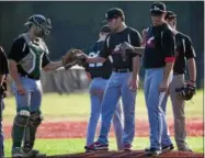  ?? JEN FORBUS — THE MORNING JOURNAL ?? The Ironmen infield offers some encouragem­ent to pitcher William Laidlaw.