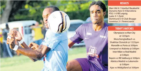  ??  ?? Molynes United’s Zavian Williams (right) duels with Central Kingston’s Romario Davey during a Magnum/KSAFA Super League match at the Barbican Complex in 2016.