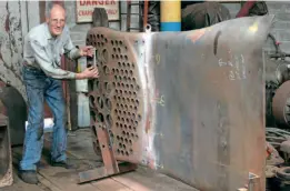  ?? ?? Peter Scott in 2007, hard at work on the firebox of Dublin & South Eastern Railway 2-6-0 No 461. HUGH DOUGHERTY