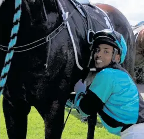  ?? ?? A smiling Ashvin Mudhoo unsaddles Grand Prospect after his win at Otaki last week.