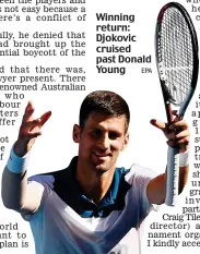  ??  ?? Winning return: Djokovic cruised past Donald Young