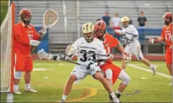  ?? M JOHN MCCONNEY - FOR DIGITAL FIRST MEDIA ?? Spring-Ford’s Jarrod Marenger works with his back to goal against the defense of Perkiomen Valley’s Remy Sell Monday.